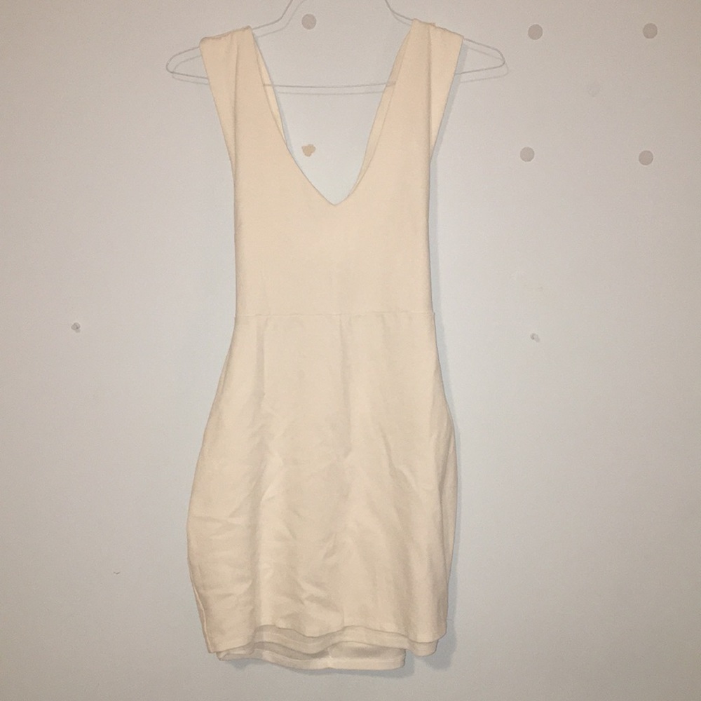 Off white body on dress with cross back straps